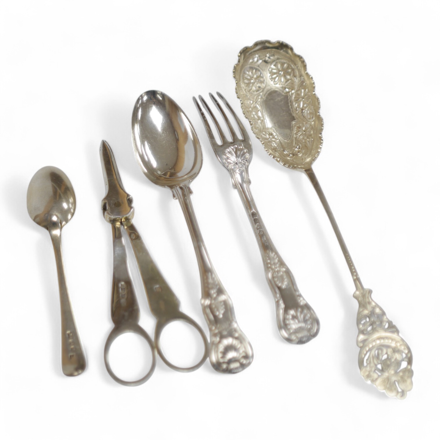 A pair of Edwardian silver grape shears, Sheffield, 1906 and four other items of silver flatware, 9oz. Condition - fair to good